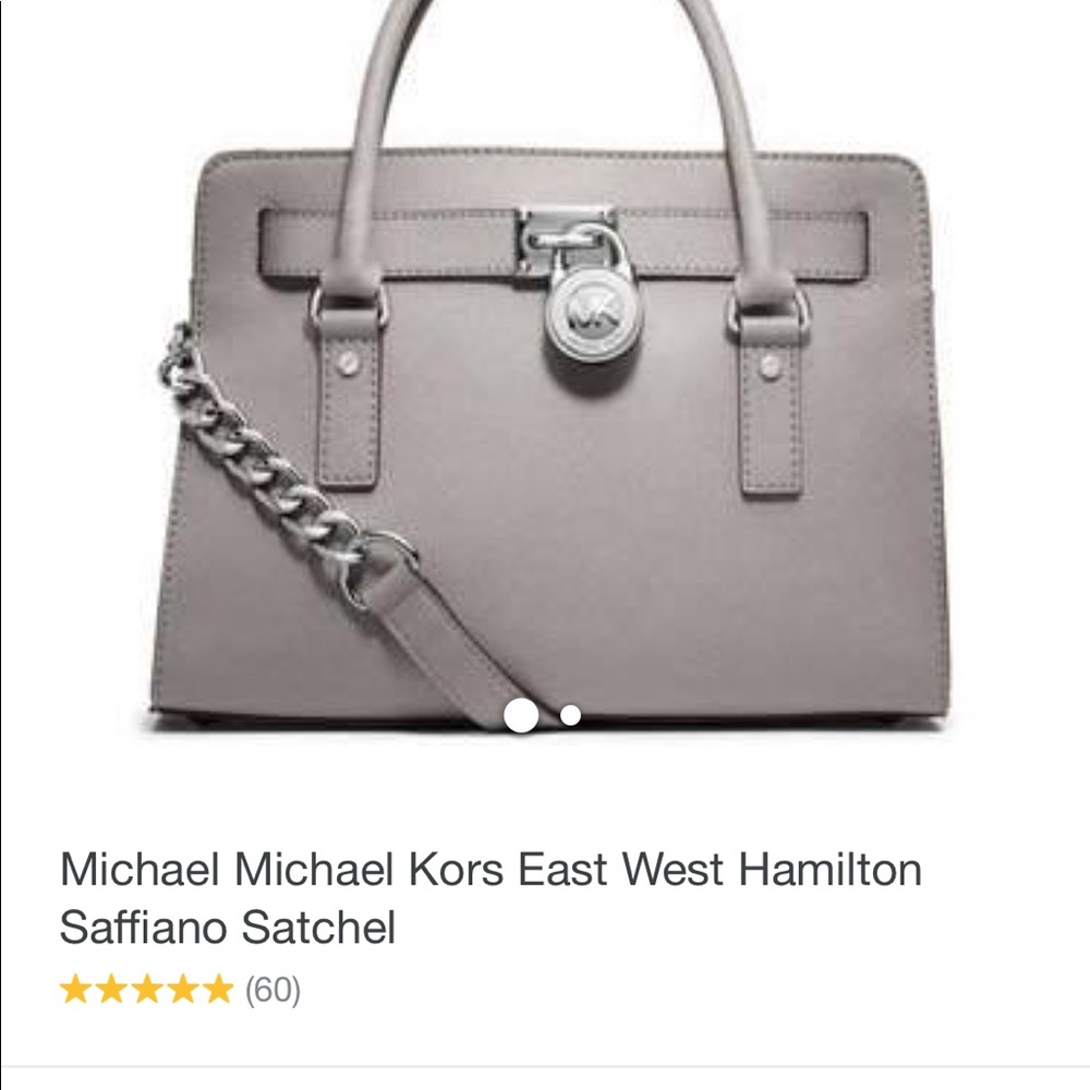 Micheal Kors. A beautiful gray with silver satchel